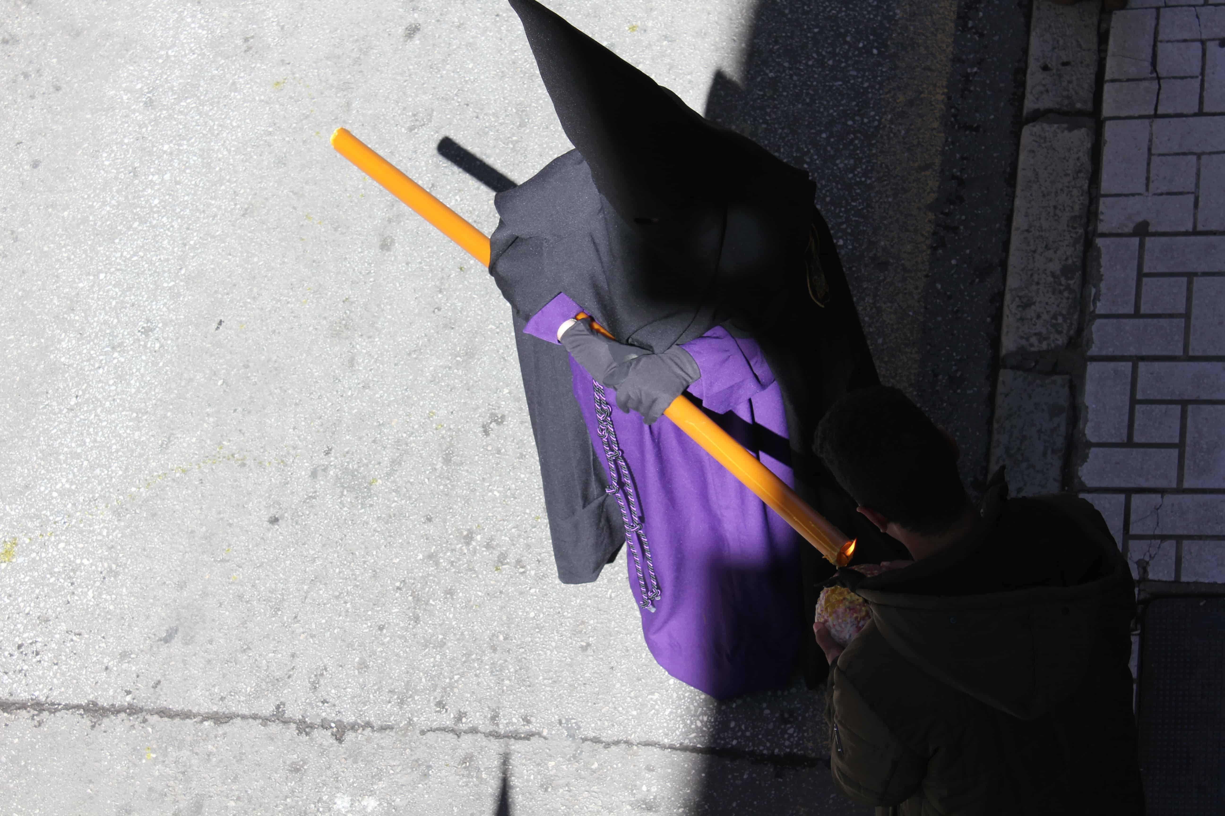 Collecting wax for the ball Processions in Malaga, Semana Santa in Malaga Spain, Holy Week in Malaga Spain