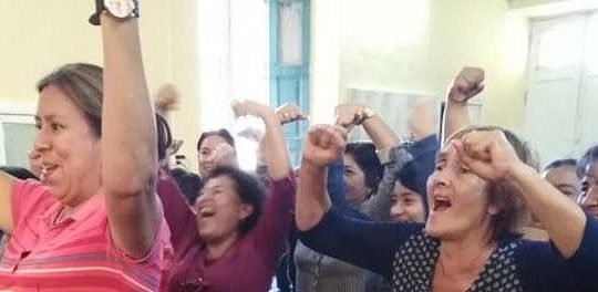 women at library cheering