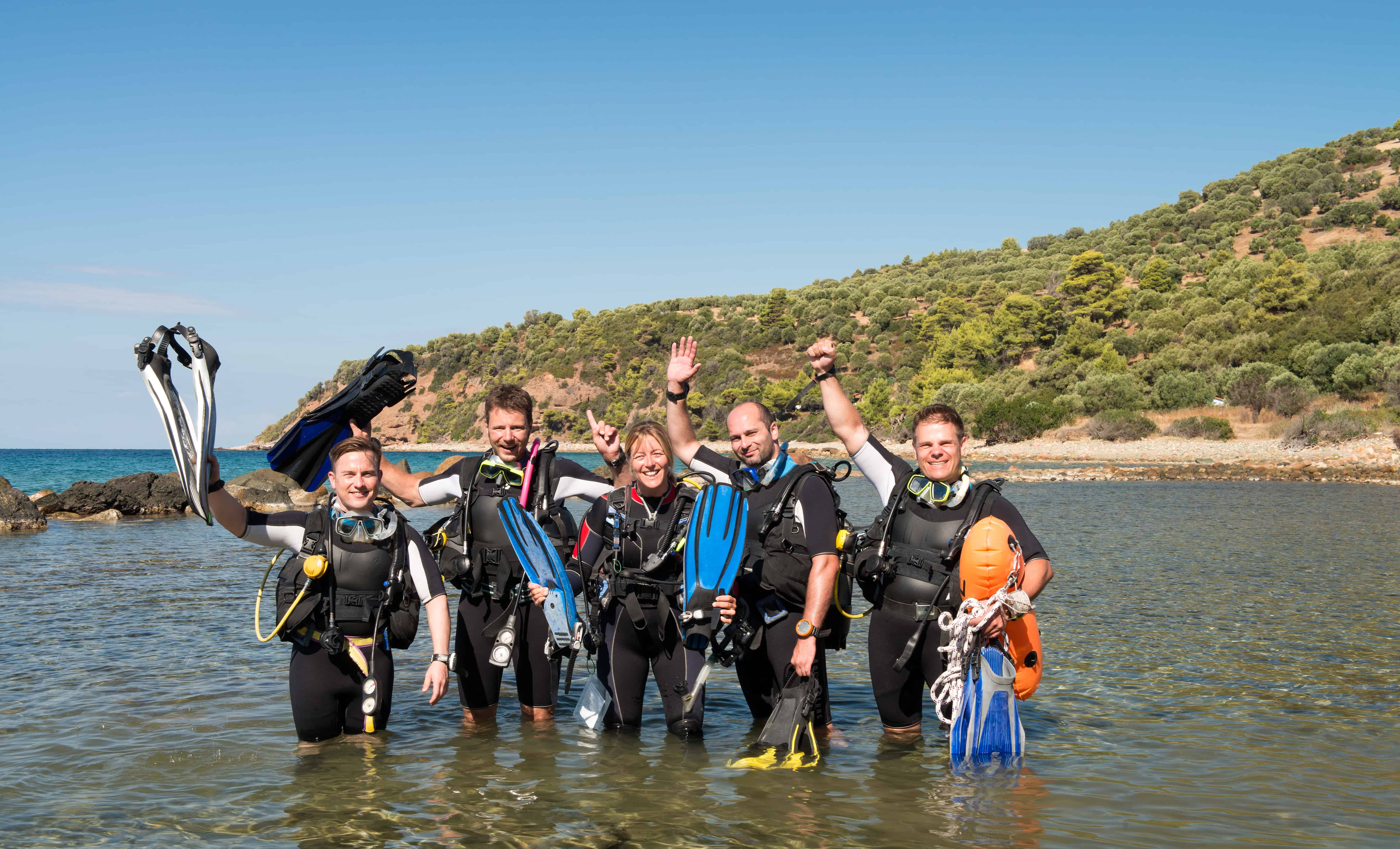 Group of divers ready to debrief Group of divers ready to debrief