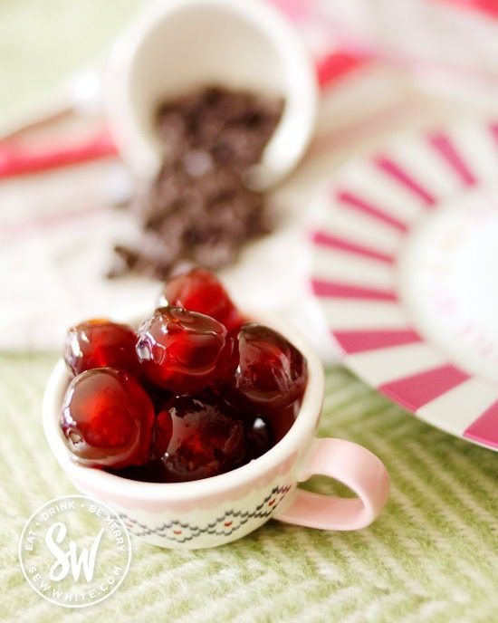 bright rich and red glacé red in a little country style measuring cup