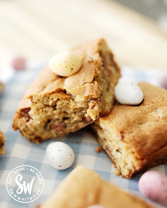 Chunky and squidgy Mini Egg Cookie cooked as a Traybake studded with mini eggs on top