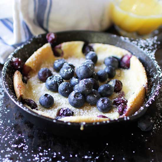 Berry Filled Dutch Baby For One | One Dish Kitchen | Holiday Gift Guide