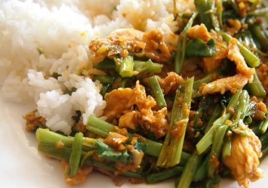 Cambodian chicken with lemon grass and basil. Our version also used morning glory. Add fresh red chillies to taste.