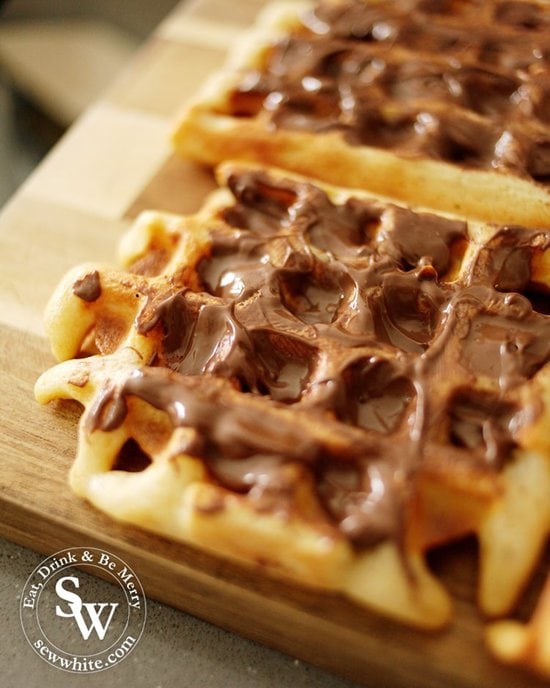 melted nutella on a hot buttermilk waffle ready for afternoon tea. From the recipe Afternoon tea waffle bites by Sew White