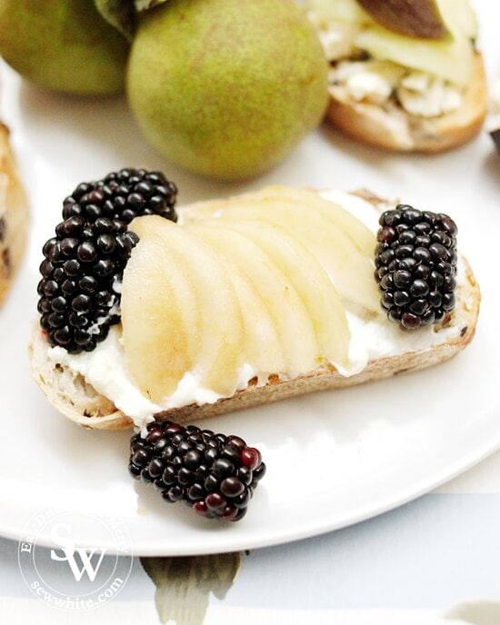 fresh blackberries, pear and cream cheese on toast