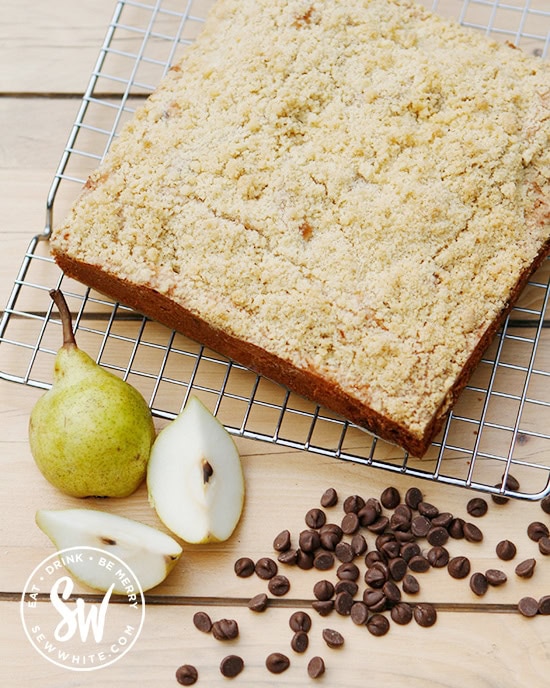 baking with fresh pears, a golden brown baked pear crumble cake made with chocolate chips