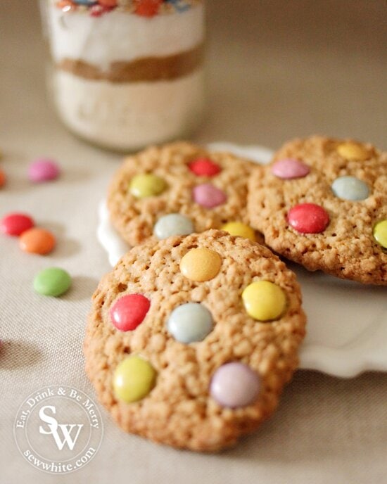 Golden baked oatmeal cookie with Smarties and chocolate chips