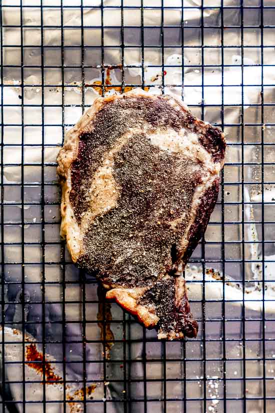 rib eye steak that has been oven baked as part of the reverse sear steak method