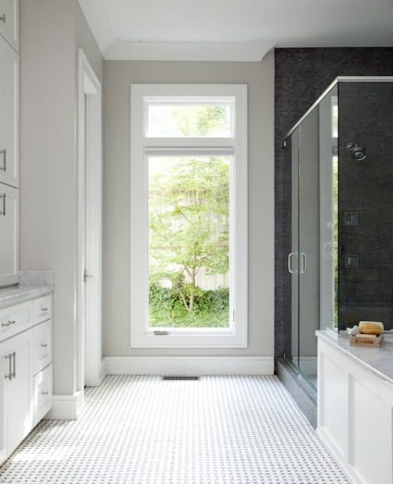 Repose Gray by Sherwin Williams is the perfect warm gray that you've been looking for. It will work in any room in your home, guaranteed! Repose Gray brings warmth to a bathroom with northern light