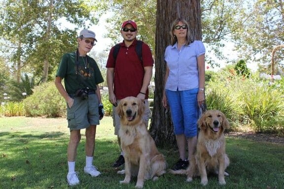 Apache with his puppy raisers Apache with his puppy raisers