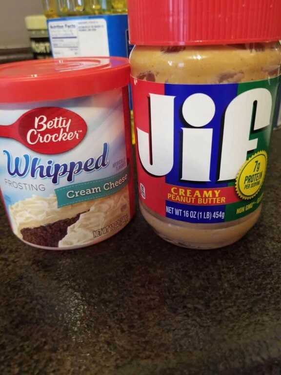 Ingredients for peanut butter fudge: peanut butter and cream cheese frosting.