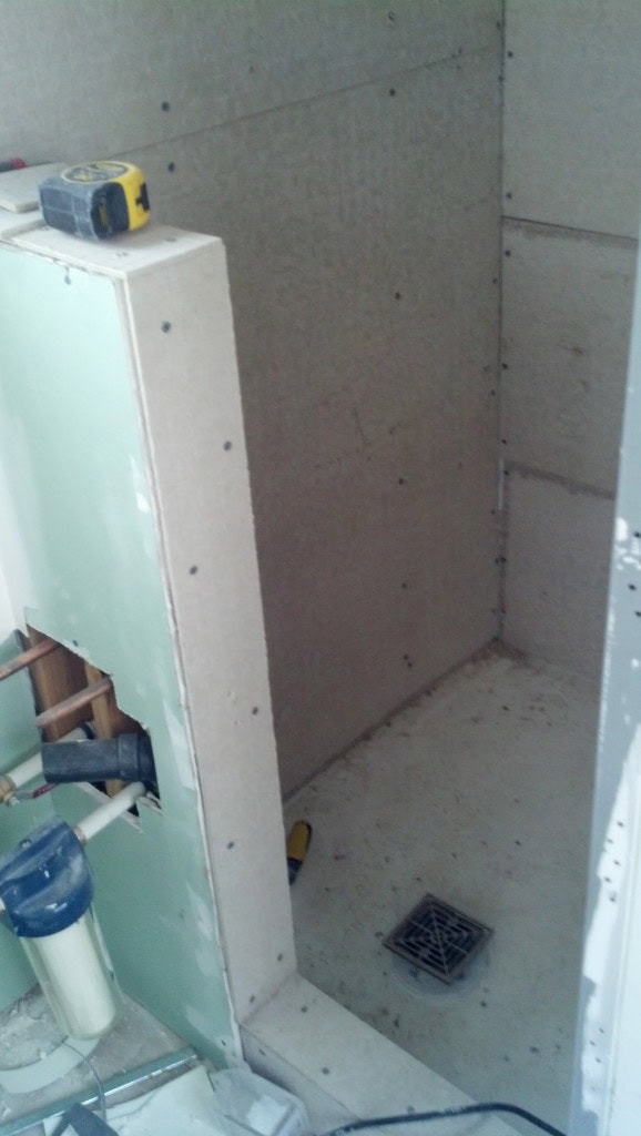 My half wall with the water filter in the bottom left.