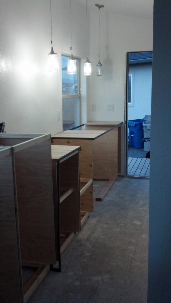and I even got the counter mostly ready, the opening in the counter is where the sink will go.