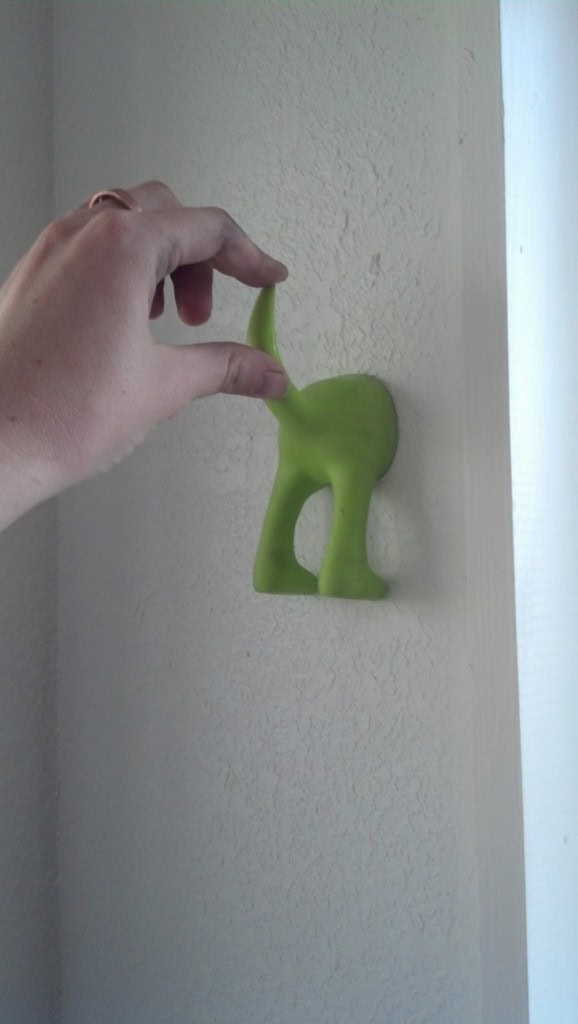 On my trip i experiences my first impulse buy ever... and I bought dog butts... these are the towel holders in my bathroom and this is my accent color :)