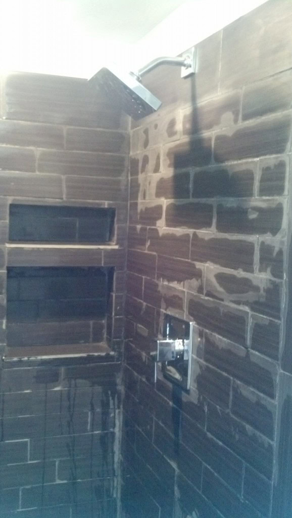 Still a lot of work cleaning it up and several more wipe-downs to get rid of all the mortar I messed up on and dust but it is actually still coming off pretty well with water and a scrubby pad, just lots to do there...