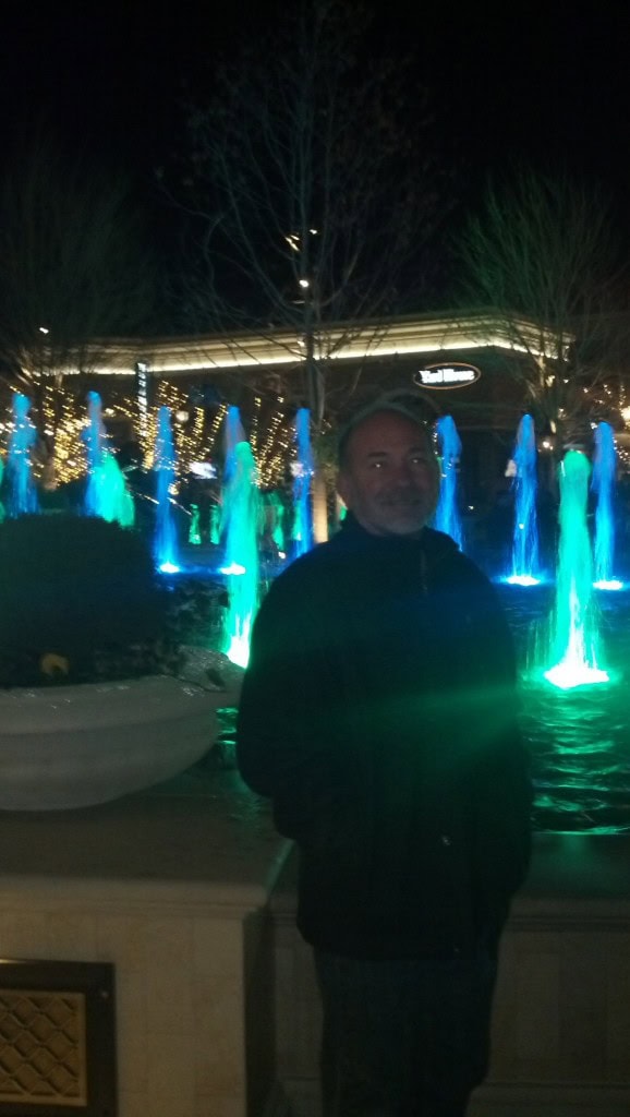 My brothers and I took a little trip to the new town center too, it is a pretty bumping place, the restaraunts all had 2.5-3 hour waits so we just tooled around and went to our favorite Thai place for dinner. Here is Jeff in front of one of the best fountains in the country apperently, According to the developer the motor on this fountain is more powerful than the Bellagio. They aare also in the process of putting in an outdoor ice skating rink, that will be pretty cool to check out :)