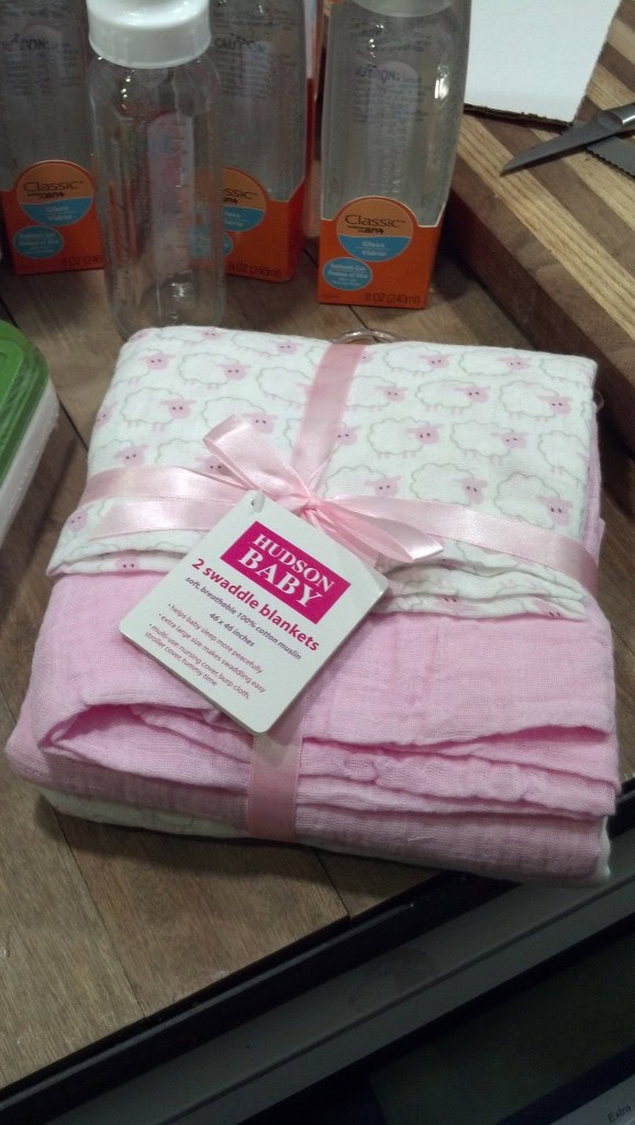 And I just can't believe the generosity of people! I got these in the mail yesterday, some items from my baby registry, some adorable swaddles, thank you Alina!