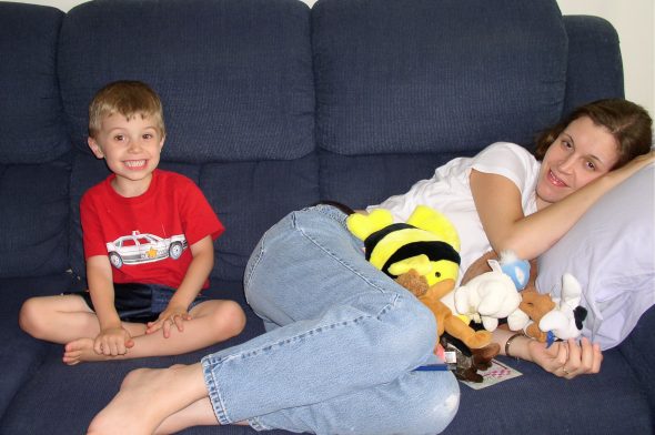 Kristen lying down on the couch
