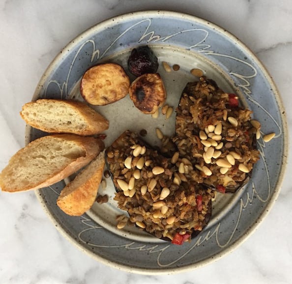Lentil Rice Stuffed Roasted Eggplant, shown with roasted turnip, roasted beet, roasted potato, and homemade French bread.