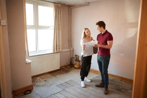 young couple moving into new house