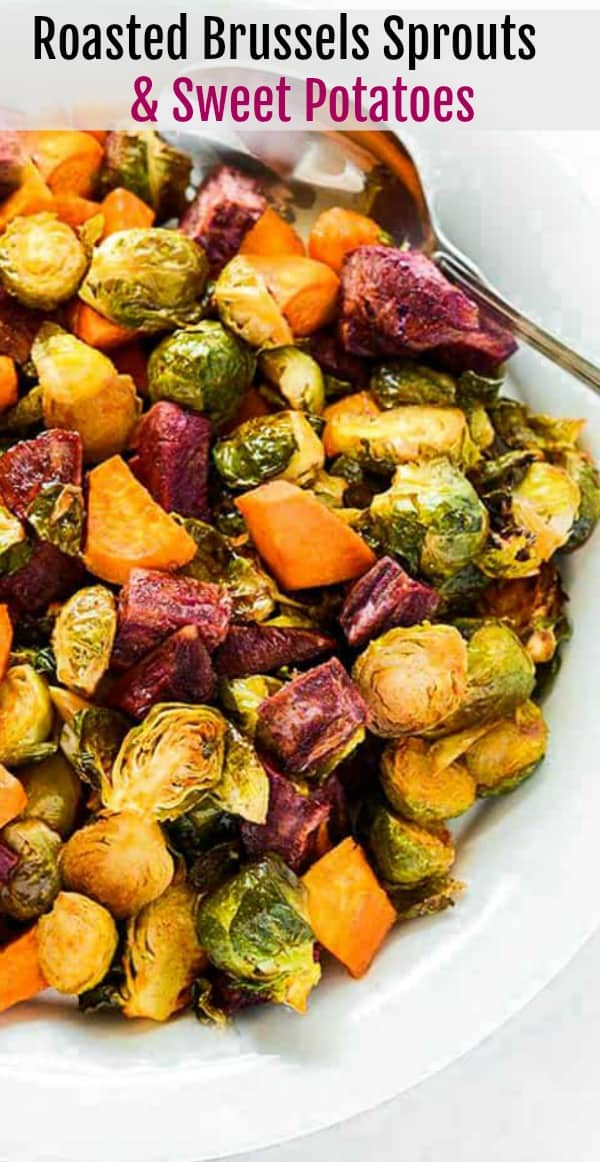 Maple Roasted Brussels Sprouts And Sweet Potatoes Healthier Steps Spread on a baking sheet. maple roasted brussels sprouts and sweet potatoes