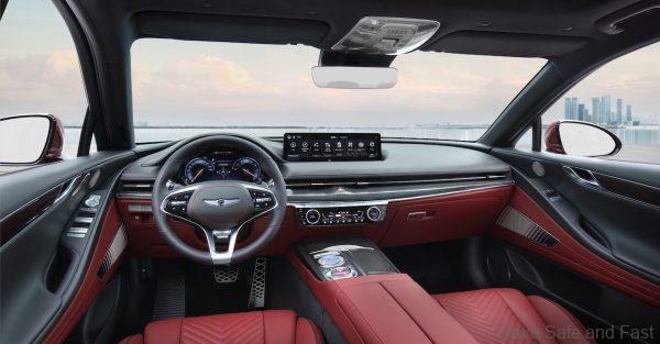 The modern building supports the vertical column three-dimensional parking lot Genesis G80 Sport interior