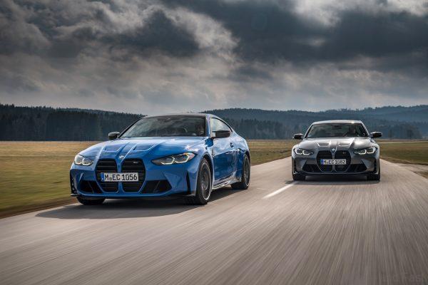 BMW M3 Competition Sedan with M xDrive with BMW M4 Competition Coupé with M xDrive in Motion front