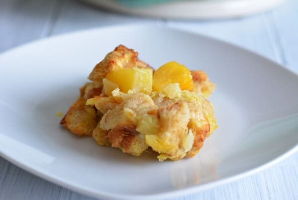 Pineapple souffle on a white plate.