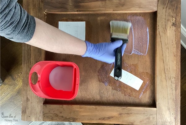adding stamps to shipping crate