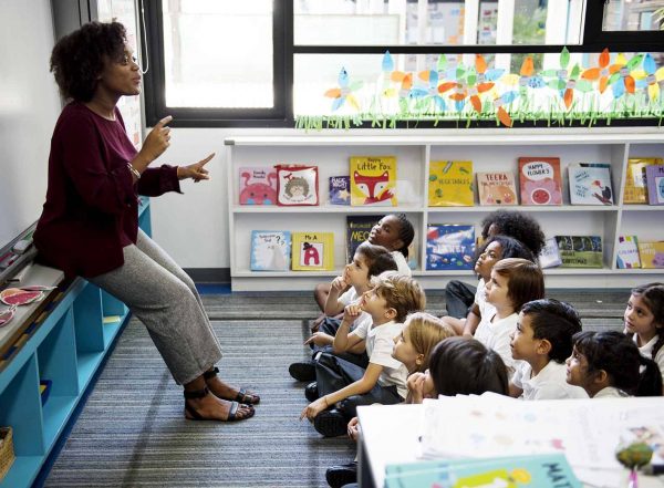 supporting sensory processing at school teacher sitting at the front of the class talking