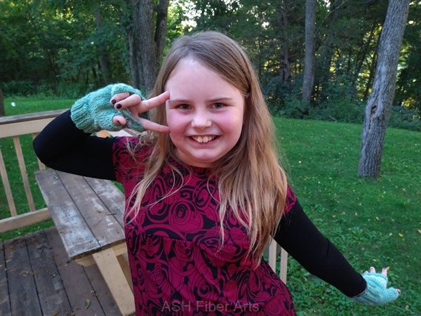 Homecoming Fingerless Mitts with a silly model