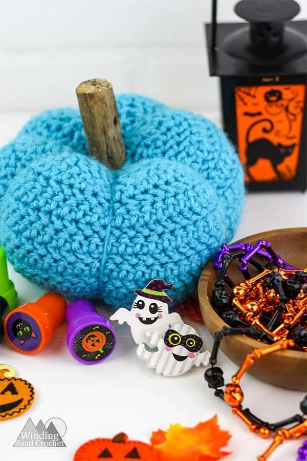Pretty Little Crochet Pumpkin Free Pattern | This little pumpkin is great for your fall decorations. This crochet pumpkin has a unique texture and is a fun quick project. #pumpkin #crochet #crochetpumpkin #fallcrochet