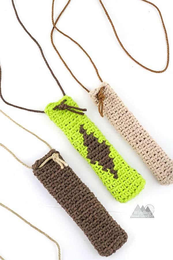 Free crochet pattern for a hook pouch necklace that can be worked up quick and easy. This is great project for beginners and make a beautiful bohemian inspired pouch necklace that is perfect for keeping your crochet hooks safe. #crochetpattern #crochetnecklace #quickcrochet