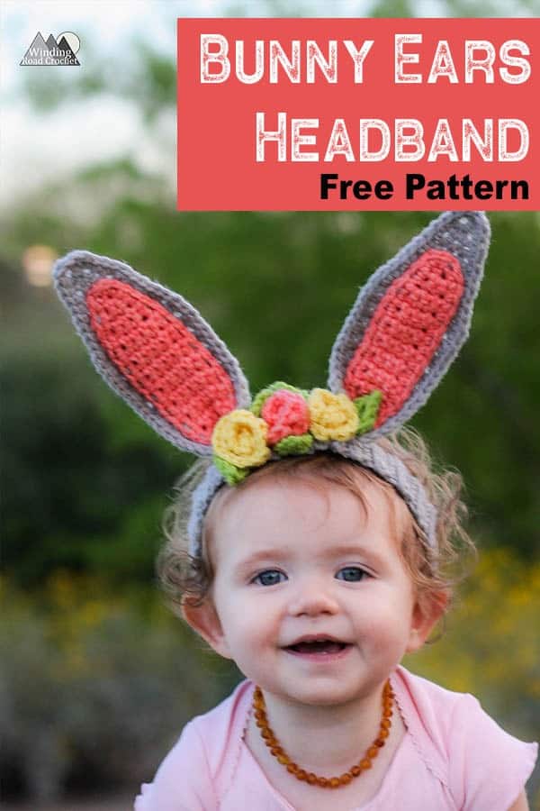Crochet bunny ears headband with flowers for a child in your life. This is the perfect accessory for easter and spring photos. This free crochet pattern will walk you through the steps to make this baby headband. #crochetheadband #eastercrochet #springcrochet