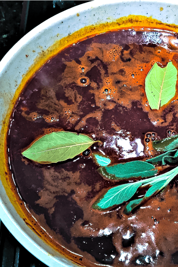 Broth for braised short ribs with fresh herbs