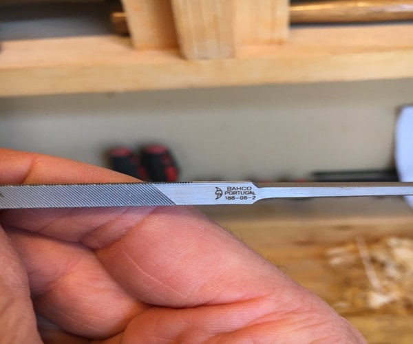 sharpen blade with a file