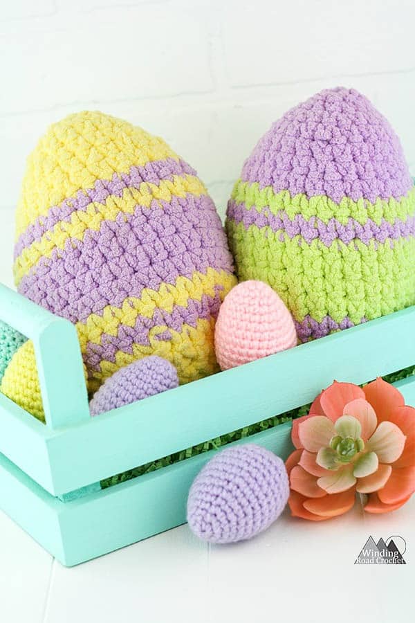 This free crochet pattern is quick and easy and perfect for easter. The Easter egg plushie use a little yarn and only about 30 minutes to make. #eastercrochet #crochetplush