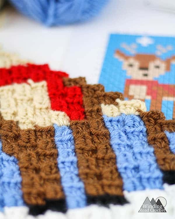 The Shy Deer Crochet C2C Square | Crochet a beautiful blanket for the holidays, using the corner to corner crochet method. Free Crochet charts and written pattern available. Woodland Winter Wonderland C2C Corner to Corner Crochet Blanket. Use the charts for any tapestry crochet, make a wallhanging, or just make one square into a holiday tote. #crochet #crochetpattern #crochetgraph