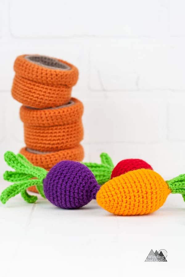 Crochet baby toy, the amigurumi container garden. This crochet toy is great for kids and babies. If uses easy amigurumi techniques to complete this free crochet pattern. #