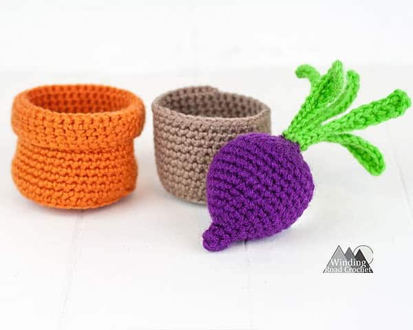 Crochet baby toy, the amigurumi container garden. This crochet toy is great for kids and babies. If uses easy amigurumi techniques to complete this free crochet pattern. #