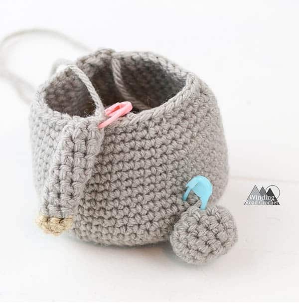 Learn how to use crochet stitch markers and some extra tips and tricks for using stitch markers. Also learn where to get the printable stitch marker tags. #crochettips #stitchmarkers #crochetstitchmarkers