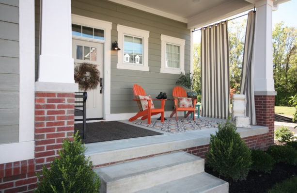 a simple-looking front door trim that complements the window casing