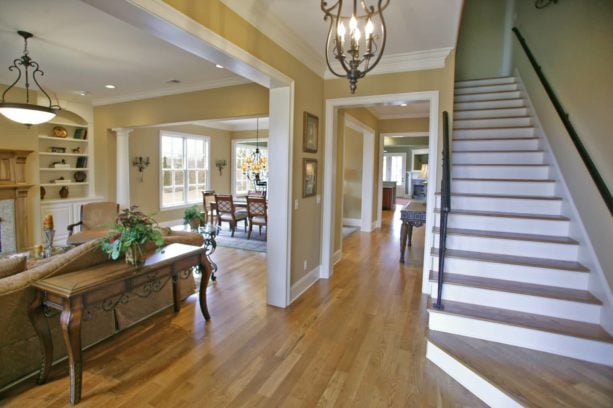 traditional interior with beige wall, white trim, and wood floor
