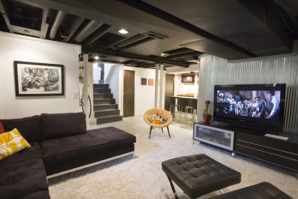 remodeled basement with corrugated metal wall