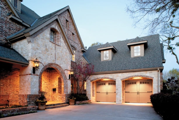 brick accent carport idea in front of a craftsman garage