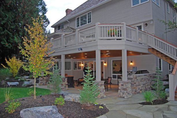 lower level living space idea- under deck patio with pine panel ceiling