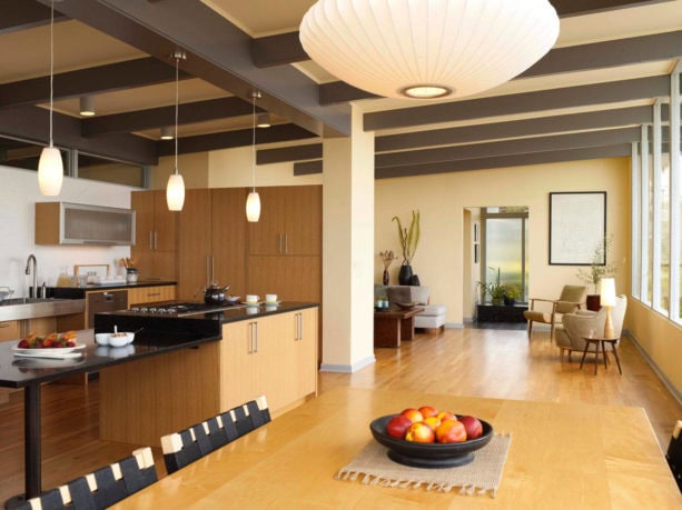 an open-style mid-century modern interior with clear-finished red oak floor