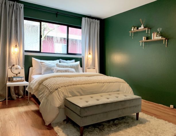 a nice, contrasting look from light gray curtains and dark grey wall combination