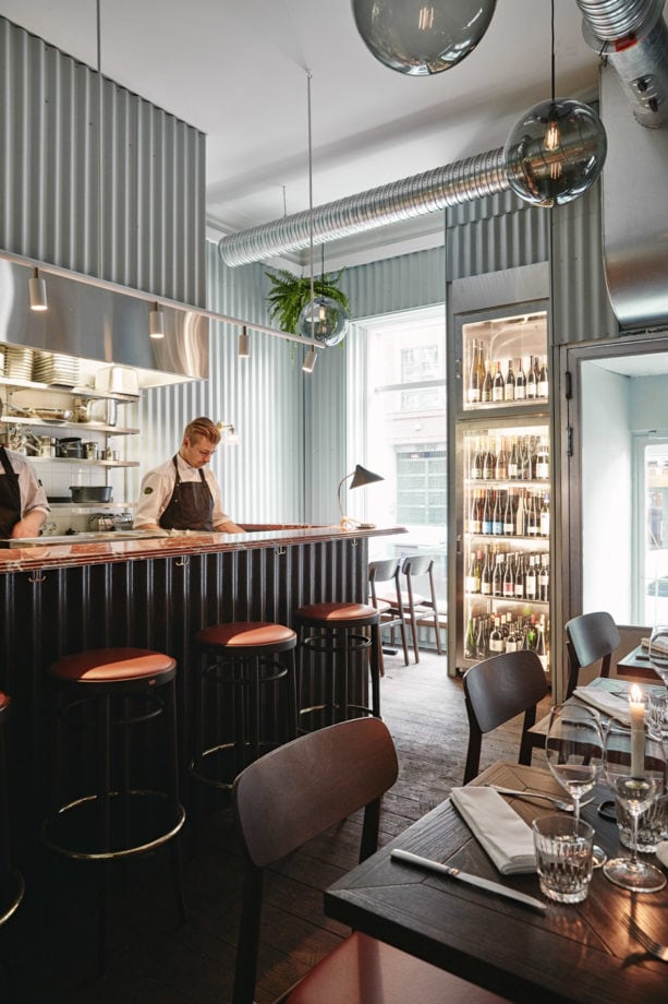 the use of corrugated metal panels on restaurant walls and bar