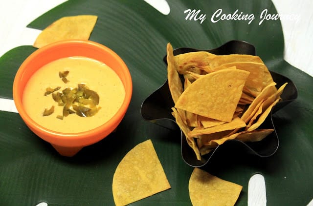 Baked Tortilla Chips Tortilla chips with cheese sauce